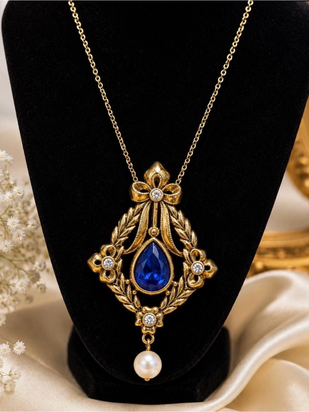 Avon Vintage-Style Gold Necklace with Blue Teardrop Crystal and Pearl Pendant